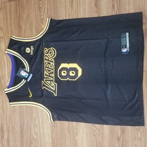 KOBE BRYANT 8 AND 24 SWINGMAN JERSEY.